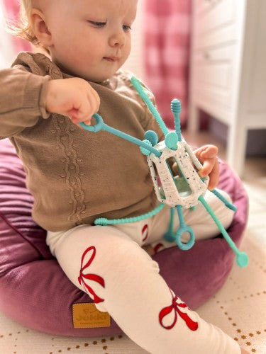 Przeciąganiec Zippee Miętowy. Zabawka sensoryczna