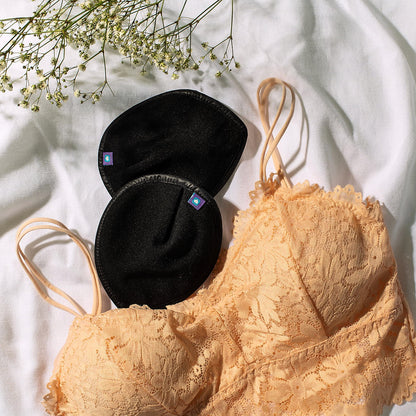 Wkładki laktacyjne wielorazowego użytku w kolorach jasnoróżowym i czarnym - Lansinoh