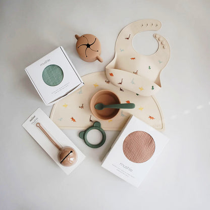 Śliniak silikonowy - Mushie Dinosaurs