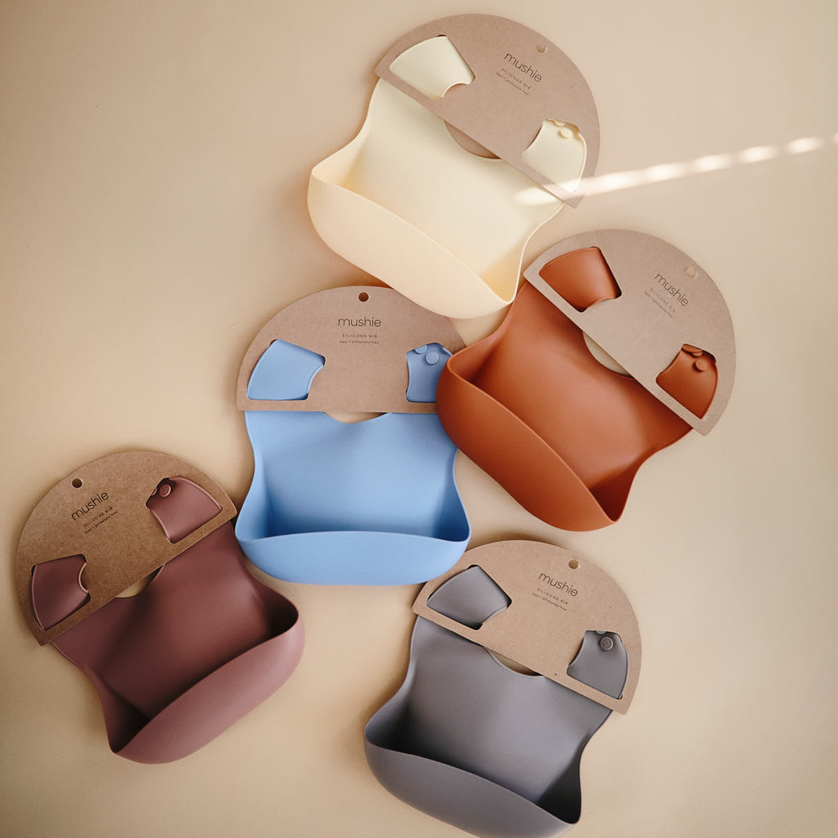 Śliniak silikonowy - Mushie Sunshine