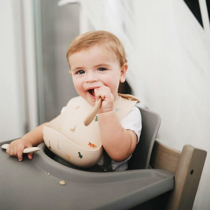 Śliniak silikonowy - Mushie Dinosaurs